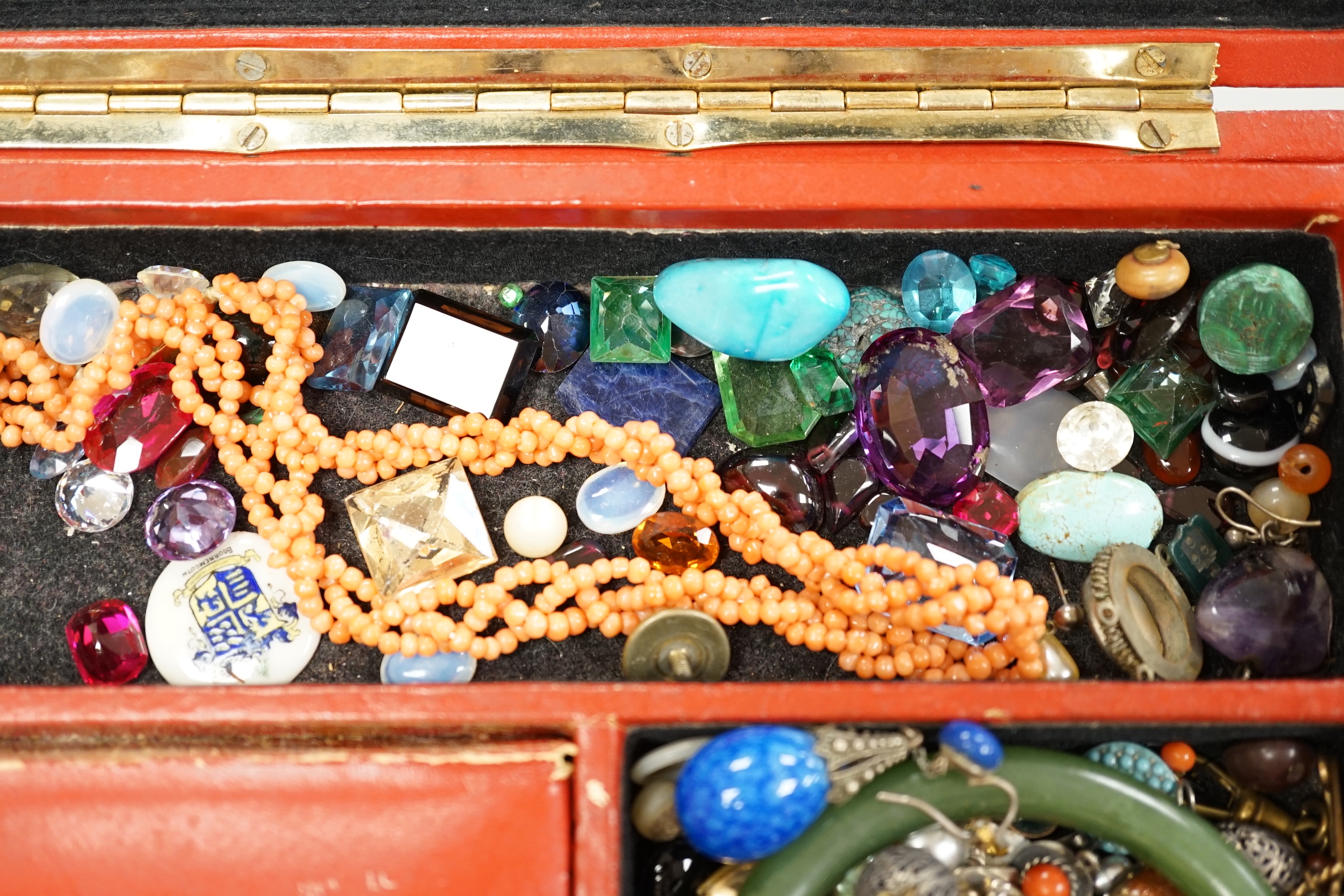 A box of assorted jewellery including loose stones, coral necklace, 9ct gold ring, a turquoise and seed pearl set yellow metal pendant, watch keys, cufflinks, costume jewellery etc.